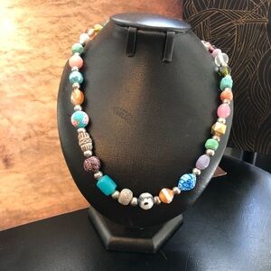 Handmade necklace with various artisan beads